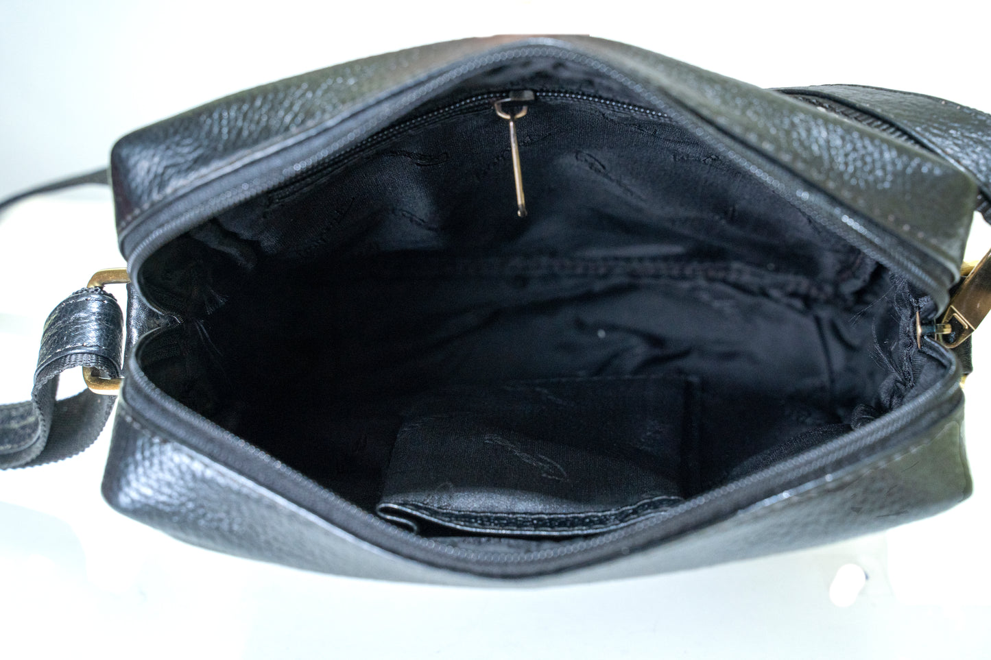 Green Hide Tauren Leather Sling Bag
